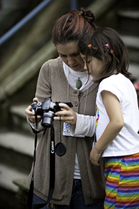 Woman and girl with camera